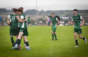 Foyle Harps players celebrate their opening goal against Portrush FC.