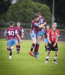 Tummery Athletic celebrate their equaliser against Derry City.