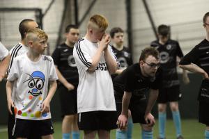 This Downs & Proud player prays for a goal during the penalty shoot-out.