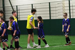 Pre-match hand shakes at the Sports With Disability competition.