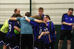 The Oxford Bulls players form a half-time huddle.