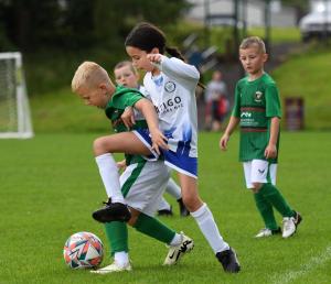 Action from the under-8's match between Glentoran and Quigleys Point Swifts.