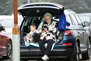 These spectators take shelter from the elements at Judges Road.
