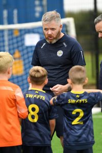 A pep talk for the Sion Swifts under-8's at Lisneal.