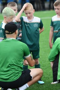 The Foyle Harps under-8's get a half time pep talk at Lisneal College.