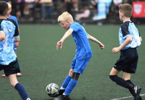 Zac Fulton, Ballinamallard United under-11's fires in a shot at goal.