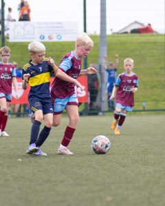 A-midfield-battle-Thursdays-Foyle-Cup-Under-10s-group-game-between-Don-Boscos-FC-and-Tummery-Athletic-FC-at-Leafair-Derry-Photos-Roisin-McFadden
