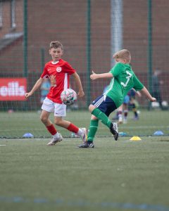 Plenty-of-flair-and-great-skill-shown-in-the-Under-10s-group-clash-between-Shankill-Juniors-and-Larne-FC-at-Leafair-Derry-on-Thursday.-Photos-Roisin-McFadden